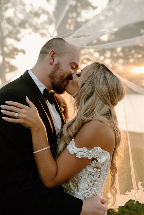 Golden hour bride and groom newlywed portraits at Bella Collina by Kayli LaFon Photography | North Carolina wedding & elopement photographer | under the veil photos Close Up Wedding Portraits, Bride And Groom Pictures With Veil, Must Capture Wedding Photos, Bride And Groom Under Veil, Fun Wedding Poses For Bride And Groom, Long Veil Photos, Bride And Groom Veil Pictures, Wedding Photos With Veil, Wedding Day Shots Photo Ideas