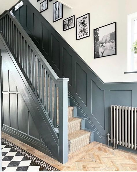 Panelling On Side Of Stairs, Wooden Panelling Staircase, Dark Paint Staircase, Dark Grey Half Wall Panelling Hallway, Stair Panelling Colour, Panelling Up Staircase, Banisters And Railings Paint Ideas, Dark Blue Stairway, Blue Stair Panelling