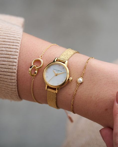 Olivia Burton | Mother of Pearl Bracelet Delicate Gold Watch Women, Watch Stacked With Bracelets, Watch With Bracelets Women, Watch And Bracelet Stack, Watches With Bracelets Women, Watch Bracelet Stack, Watch Stack, Classy Jewellery, Gold Reference