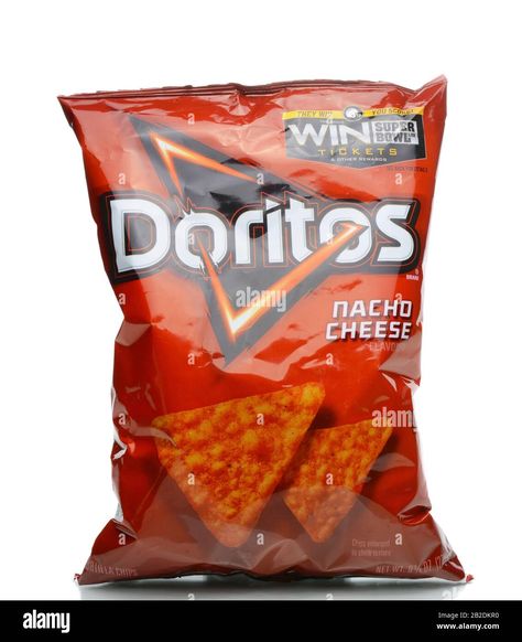 Download this stock image: IRVINE, CALIFORNIA - JANUARY 4, 2018: Doritos Nacho Cheese Chips. Flavored tortilla chips produced since 1964 by Frito-Lay, a subsidiary of PepsiCo. - 2B2DKR0 from Alamy's library of millions of high resolution stock photos, illustrations and vectors. Pizza Salami, Cheetos Crunchy, Doritos Nachos, Cheese Chips, Frito Lay, Cheese Cultures, Nacho Cheese, Corn Chips, Cheese Flavor