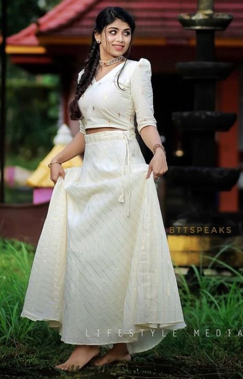 Pavada And Top Model, Skirt And Crop Top For Onam, Onam New Model Dress, Traditional Skirt Design, Onam Blouse Design For Skirt, Kerala Style Skirt And Top For Onam, Kasavu Pattupavada For Women, Kerala Traditional Skirt And Blouse, Kasavu Skirt And Top Designs