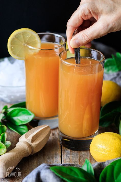 This delicious tropical drink is so refreshing, you’ll want a refill! This copycat Chick-fil-A recipe for mango passion tea is made with homemade lemonade, unsweet tea, mango nectar, and passionfruit juice. Mango Nectar Drinks, Mango Nectar Recipes, Passionfruit Juice, Chick Fil A Recipe, Mango Iced Tea, Passion Tea Lemonade, Grinch Punch, Passion Fruit Tea, Simply Lemonade