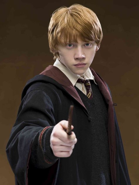 Rupert Grint as Ron Weasley. Harry Potter Gryffindor Robe, Severus Sneep, Harry Potter Cocktails, Rupert Grint Ron Weasley, Hery Potter, Film Harry Potter, Glume Harry Potter, Cho Chang, Ronald Weasley