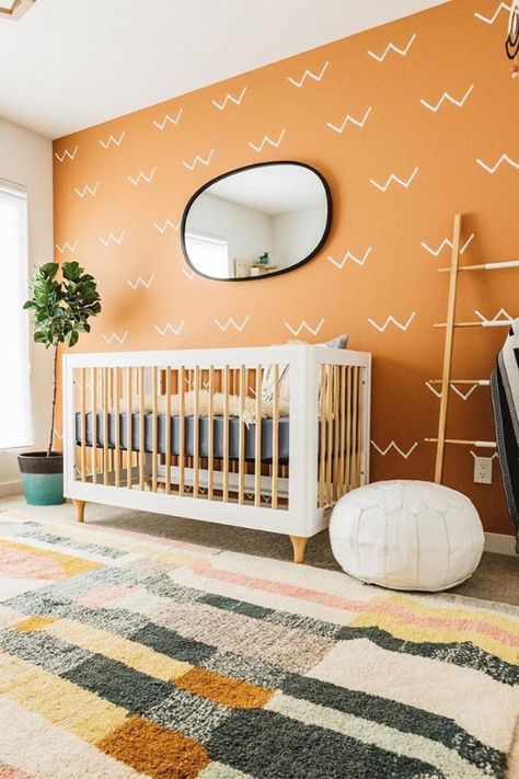 NURSERY WALL IDEAS (11) Orange Nursery Boy, Bold Nursery, Orange Accent Walls, Orange Nursery, Eclectic Nursery, Nursery Accent Wall, Yellow Nursery, Nursery Room Design, Nursery Room Inspiration