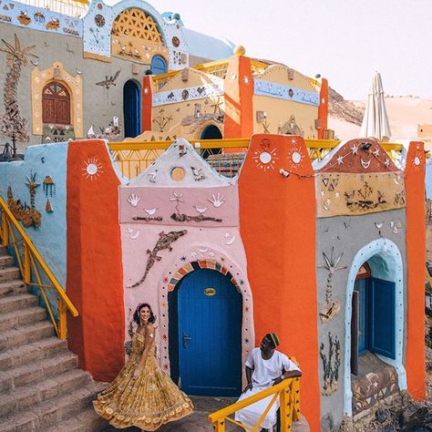 Nubian Village in Aswan, Egypt #pyramids #visitegypt #ancientegypt #instagram #egypt #egypttravel | Things to do in Egypt | things to do in Aswan Egypt| Egypt photography | Aswan Egypt things to do | Egypt travel tips | Egypt Instagram photo spots | Egypt pyramids | Cairo Egypt | Aswan Egypt photography | Abu Simbel Egypt | Aswan | Egypt travel clothes | Egypt travel clothes women | what to wear in Egypt Nubian Village, Egypt Outfits, Places In Egypt, Pyramids Egypt, Egypt Culture, Great Pyramid Of Giza, Visit Egypt, Painted Walls, Pyramids Of Giza