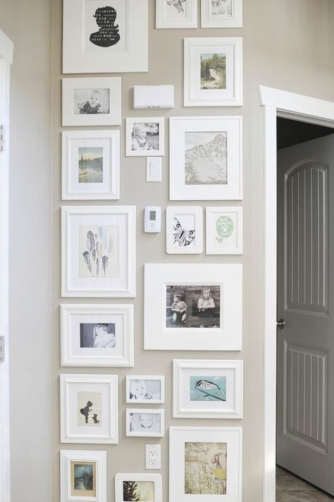 Lovely tall gallery wall to cover up outlets and thermostats. Seattle Apartment, Display Family Photos, Temporary Wall, Wall Gallery, Inspiration Wall, Style At Home, Apartment Interior, Wall Treatments, Home Fashion