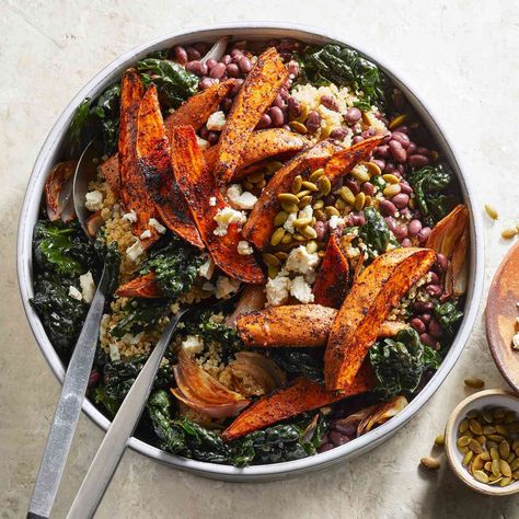 Loaded with roasted sweet potatoes and shallots, black beans, quinoa, feta and pepitas, this salad makes for a satisfying meatless meal. Massaging the kale both tenderizes it and helps the greens absorb more of the bright dressing. Massaged Kale Salad, Massaged Kale, Sweet Potato Black Beans, Winter Salad, Mediterranean Diet Recipes, Kale Salad, Fresh Salads, Roasted Sweet Potatoes, How To Make Salad