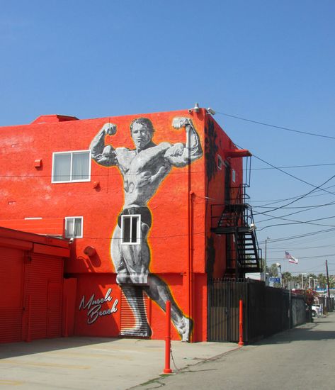 Arnold Schwarzenegger Muscle Beach Mural | BCBL Arnold Schwarzenegger Muscle, Arnold Schwarzenegger Bodybuilding, Schwarzenegger Bodybuilding, Beach Mural, Nature Tourism, Beach Street, Places In Usa, Muscle Beach, Best Graffiti