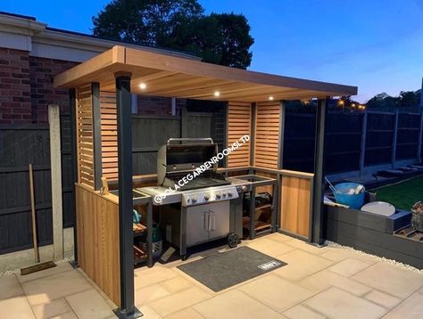 Bespoke cedar cladded BBQ area, with custom made RSJ supports in Anthracite grey powder coat • • • • • • #essex #bbqkitchen #bbqshelter #landscaping #garden #shelter #outdoor #living #outdoorlivingspace #customwoodwork #moderngarden #outdoorkitchen #gardenkitchen #cedar #homeandgarden #newbuild #essex #england #madeinengland #madetoorder Covered Bbq Area Ideas Outdoor Modern, Barbeque Area Ideas Outdoor, Pergola Bbq Area, Bbq Hut Ideas, Bbq Shelter Ideas, Bbq Shelter, Garden Shelter, Bbq Hut, Outdoor Bbq Area