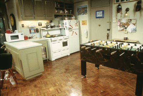 Chandler and Joey's apartment is located in Greenwich Village in Manhattan. The apartment served... Joey Chandler, Friends Apartment, Friends Scenes, Ross Geller, New York City Apartment, Foosball Table, Phoebe Buffay, Linoleum Flooring, Chandler Bing