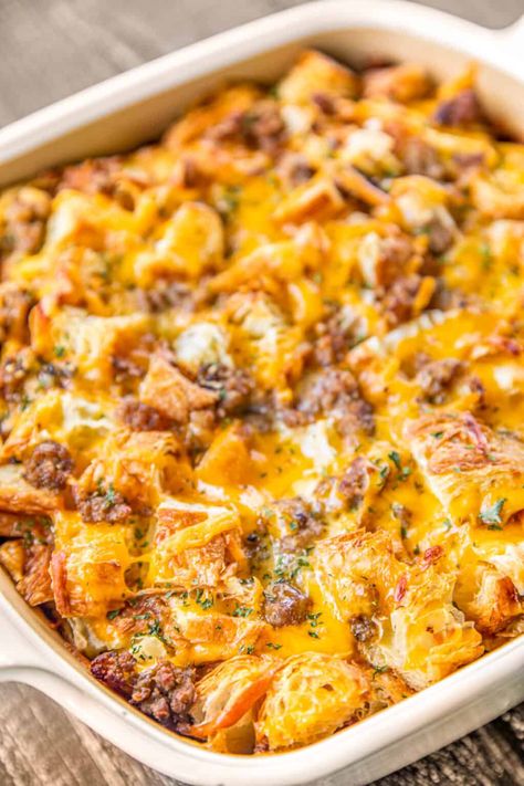 Sausage Croissant Breakfast Casserole - we love this easy overnight breakfast casserole! Only 6 ingredients! Sausage, croissants, cheddar cheese, eggs, half-and-half, and dry mustard. Assemble the night before and bake in the morning. Great for breakfast, brunch, lunch, dinner, and overnight guests. #casserole #breakfast #croissant #sausage Croissant Leftover Recipes, Sausage Croissant, Overnight Sausage Breakfast Casserole, Easy Overnight Breakfast Casserole, Easy Overnight Breakfast, Croissant Recipes, Croissant Breakfast Casserole, Plain Chicken Recipe, Cabin Food