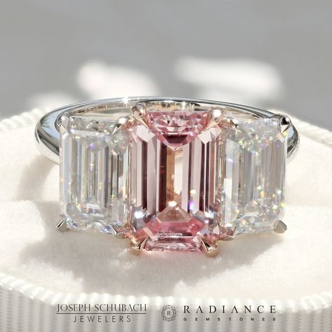 A Joseph Schubach design. This three stone emerald cut ring features a 3 1/2ct Radiance® Pastel Pink emerald cut lab grown sapphire and two Radiance® Premium emerald cut moissanites weighing 3.4ct total (diamond equivalent). The setting is crafted in 14kt rose gold and platinum. Contact us for additional info or to make this with different stones. Luxury Rose Gold Three Stone Jewelry, Pink Emerald Cut Engagement Ring, Three Stone Emerald Cut Ring, Fancy Pink Diamond Ring, Damascus Steel Wedding Band, Dig Jewelry, Pink Rings, Ring Leader, Pink Diamonds Engagement