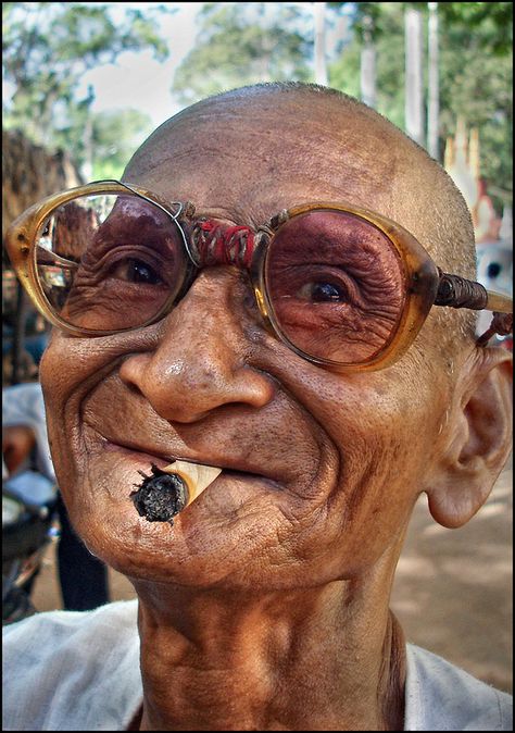 "Old man from Siem Reap, Cambodia." - Original Photo Look how happy he is! I don't think there's much of a lesson on "don't smoke" here, so much as one on enjoying and living your life to the fullest! Siem Reap Cambodia, Siem Reap, Old Man, Cambodia