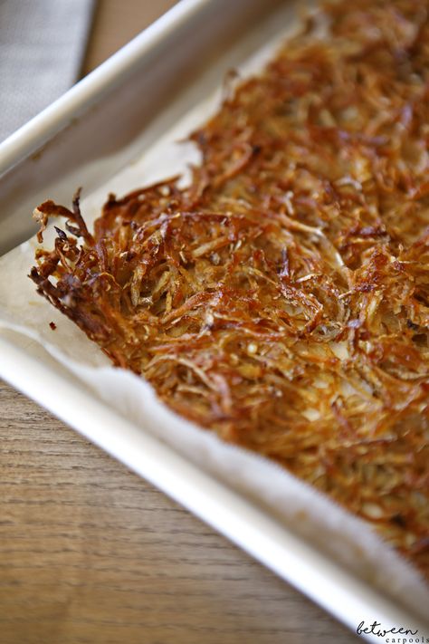 How to Prepare Hash Browns on a Sheet Pan | Between Carpools Sheetpan Hashbrowns, Sheet Pan Hash Browns, Sheet Pan Hashbrowns, Oven Hashbrowns, Homemade Hashbrowns, Crispy Hashbrowns, Sheet Pan Suppers, Shredded Potatoes, Fresh Potato