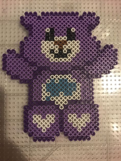 Purple care bear perler bead Perler Bead Care Bears, Purple Perler Beads, Care Bear Perler Beads Pattern, Care Bear Perler Beads, Purple Care Bear, Hammer Beads, Hama Disney, Easy Perler Bead Patterns, Melty Bead Patterns