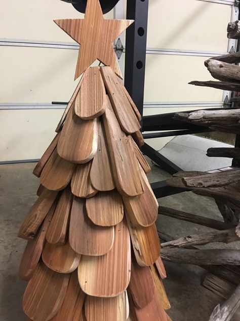 Made this tree with left over cedar shingles from the new "McMasters Home Gallery" in Loretto, Tennessee. On display in there showroom during Christmas. Cedar Projects, Cedar Shake Shingles, Cedar Shingle, Wooden Trees, Shake Shingle, Cedar Shake, Cedar Shakes, Fund Raiser, Wood Shingles