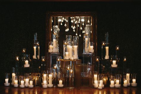 candles on candles! I want a variety of hurricane candles in front of marcs and I's table Candle Backdrop, Candles Reception, Candle Lighting Ceremony, Many Candles, Ceremony Candles, Wedding Reception Backdrop, Candle Altar, Light Backdrop, Wedding Altars