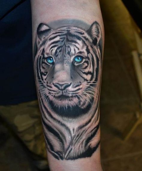 12+ Best White Tiger Tattoo Designs & Ideas | PetPress Realistic Tiger Tattoo, Tiger Tattoo Meaning, Mens Tiger Tattoo, White Tiger Tattoo, Tiger Face Tattoo, Tiger Head Tattoo, Tattoo Eye, Shin Tattoo, Tier Tattoo