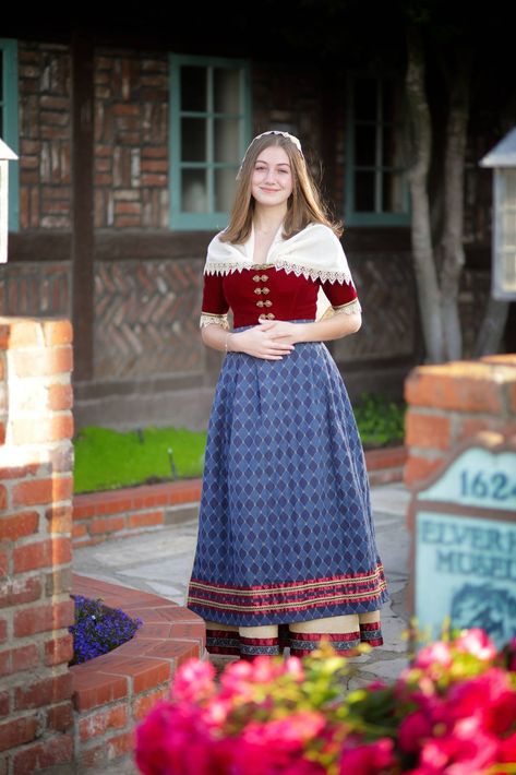 The Solvang Danish Days Foundation has named Solvang resident Gillian Nielsen as its 2019 Danish Maid. She will preside over the 83rd annual Solvang Danish Days heritage festival, which returns with a three-day weekend event, slated for Sept. 20 through 22.  Gillian admits that ever since she was a girl, she has looked up to the Danish Maid as a celebrity. "I’ve been waiting until I was old enough to be considered for the role," she explained, adding that being the first Danish Days Maid to rep" Denmark Traditional Clothing, Danish Traditional Clothing, Traditional Danish Clothing, Danish Clothing, Frozen Jr, Danish Culture, Three Day Weekend, Santa Ynez, Traditional Clothes