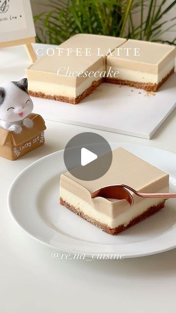 Rennie 🕊 on Instagram: "Let’s make a coffee latte cheesecake as i got a new coffee maker from @siroca.idn 🤎 look ar the design! It’s so pleasingly aesthetic and minimalist 🥰 it’s making my coffee time more enjoyable 🤎🤭 Recipe: Biscuit base (lotus biscoff crumbs 120gr, melted butter 50gr) Cheesecake: 200gr cream cheese 50gr sugar 30gr milk 8gr gelatin 130gr whipping cream (whipped until yogurt texture) 50gr coffee liquid How to : 📌mix buscuit crumbs and melted batter, and put in square mold 📌 mix together cream cheese and sugar using spatula until creamy 📌 mix bloomed gelatin into warm milk, and add to cream cheese mixture Mix well 📌add whipped cream and mix well 📌 put half of the batter on top of the biscuit base, and freeze for 20 mins 📌 add coffee liquid to the rest of the bat Cheese Cakes Design, Biscuit Base Recipe, Cheesecake Square, Cheesecake Squares, Coffee Cheesecake, Batter Mix, Lotus Biscoff, How To Make Cheesecake, Easy Cheesecake Recipes