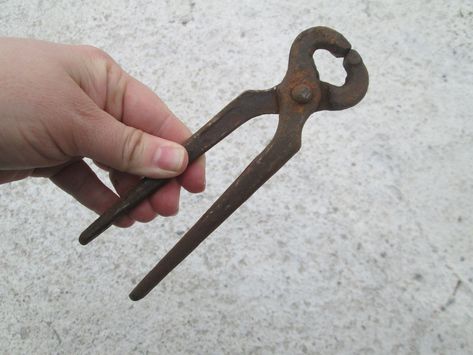 Vintage iron pliers, Antique tools, Metal Tool, Vintage pincers, Antique pincers, Vintage home decor, Iron tongs, Old hand tools, Famfouse. These are old antique pliers from the 1940s and 1950s, covered with rust and patina. In good vintage condition with signs of time and use. DIMENSION:  length : 6.30 in (16 cm) width: 1.80 in (4.5 cm) I send each item recommended with tracking number. for more items visit my shop here: https://www.etsy.com/shop/VintageJuliyaHome Thank you for visiting my store! Vintage Lampshades, Antique Hand Tools, Vintage Hand Tools, Antique Tools, Metal Tools, Old Hands, Antique Cast Iron, Old Tools, Tongs