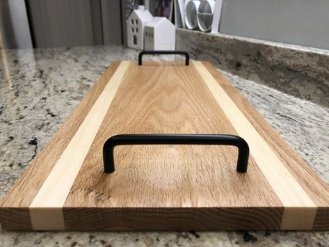 A lot of credit here goes to my wife. She wanted to give gifts to her coworkers and loved the idea of creating something herself. A lot of those coworkers enjoy hosting, so she came up with the idea of serving trays. A few pieces of wood, a few drawer pulls/handles and a little TLC later, we had several different varieties - each unique in its own way. This is a really quick and pretty simple DIY - whether you are looking for a gift like us or want to create something pretty for your o… Easy Diy Candy, Trays Diy, Diy Serving Tray, Butcher Block Oil, Wood Trays, Picture Molding, Glass Light Shades, Bathtub Tray, Bed Tray