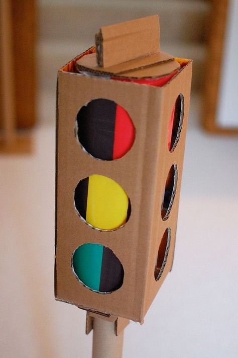 How to make a traffic light out of cardboard boxes...love this. Also how to make cardboard car, gas tank, etc. Fun site. by KarlaChS Cardboard Car, Ikat Bag, Cardboard Toys, Seasonal Crafts, Dramatic Play, Traffic Light, Cardboard Crafts, Diy Toys, Craft Activities