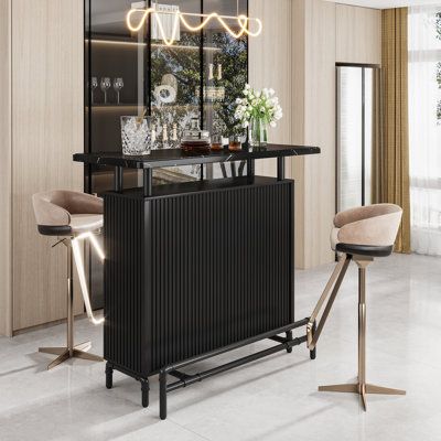 The stylish design modern home bar unit features a sleek and modern design that will add a touch of sophistication to your home kitchen or pub. With its faux marble tabletop and industrial-inspired metal frame, this bar unit is perfect for those who appreciate contemporary aesthetics. | Williston Forge Samina 47.25" Home Bar Wood / Metal in Black / Brown / Gray, Size 44.25 H x 19.75 D in | Wayfair Bar Designs For Home Small Spaces, Bar Unit For Home, Home Bar Unit, Small Bar Cabinet, Mixing Cocktails, Free Standing Bar, Home Bar Table, Bar Counter Design, Modern Home Bar