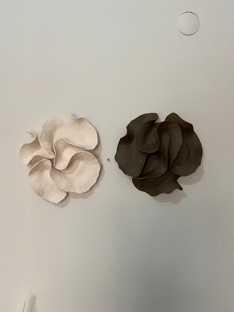 I used brown and beige ceramic clay when creating my product. They are single fired and unglazed products. That's why it has a matte and textured surface. When you touch the products, you will feel the notches on the surface. It was cooked at 1080 degrees. The inspiration for my product, which is completely handcrafted, is the corals in the sea. If you want to see and feel the texture of mud in its raw form on your walls, this product may be just for you. The back of the product is designed to help you easily hang it on the wall. You can attach it to your wall with the help of a strong nail. Product dimensions are approximate brown statue diameter: 35cm beige statue diameter: 35cm Please review my store policies before purchasing the item. Diy Clay Wall Hanging, Ceramics Wall Art, Ceramic Sculpture Abstract, Abstract Ceramics, Pottery Wall Art, Wall Art Ceramic, Ceramic Wall Planters, Clay Wall Hanging, Ceramic Wall Sculpture