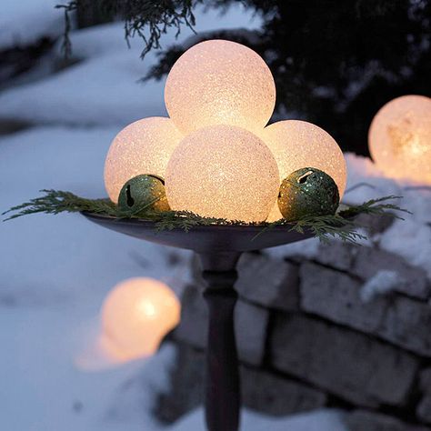 Glowing Holiday Globes  Glowing frosted globes (available in large and small sizes from home-improvement stores) take the edge off a chilly ... Best Outdoor Christmas Decorations, Jul Diy, Outdoor Holidays, Outdoor Holiday Decor, Outdoor Christmas Lights, Toy Shop, Decorating With Christmas Lights, Magical Christmas, Christmas Deco