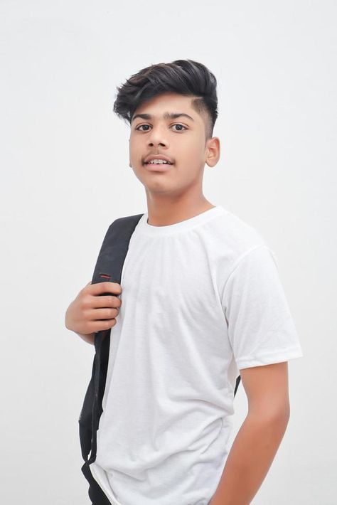 Handsome Indian young boy wearing white t-shirt. Attitude Stylish Boys Pic, Student Photo, Boys Pic, Indian Boy, Boys Wear, Stylish Boys, Guy Pictures, Man Photo, Free Shirts