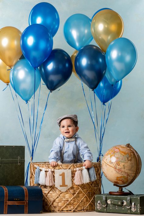 Baby Boy's explorer themed 1st Birthday Photoshoot #babyboyfirstbirthdayideas #adorablebabyoutfit #simplefirstbirthdaytheme #babyphotoshootideas #explorer #wonderousone #hotairballoon Boy Photoshoot, Cake Photoshoot, Headshots Portraits, Themed 1st Birthday, Child Portraits, 1st Birthday Pictures, 1st Birthday Photoshoot, Smash Cake Boy, Baby Boy First Birthday