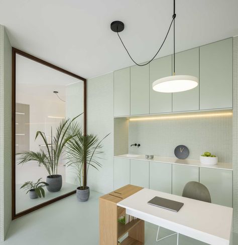 Pastel Green Palette, Minimalist Reception Area, Minimalist Reception, Medical Clinic Design, Doctor Office Design, Calm Environment, Curved Desk, Office Interior Design Modern, Cabinet Medical