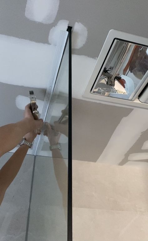 How we installed a glass floor to ceiling shower screen | Style Curator Shower Glass To Ceiling, Shower Glass Installation, Floor To Ceiling Shower Screen, Glass Ceiling Bathroom, Diy Shower Screen, Zero Threshold Shower Ideas, Fixed Shower Glass Panel, Shower Glass Partition, Primary Ensuite