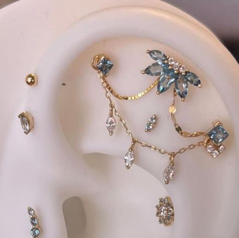 Blue Piercing Aesthetic, Weird Ear Piercings, Blue Ear Piercings, Ear Piercing Jewelry Ideas, Piercing Placement Ideas, Flat Ear Piercings Ideas, Ear Constellation Piercings, Ear Mapping Piercing, Peircings Earring Ideas