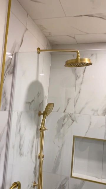 Vogt • Kitchen & Bath Fixtures on Instagram: "Dripping in Gold. Bathroom remodel by @newellsquality Featured Collection: Zehn Featured Finish: Brushed Gold #Vogt #Bathroom #BathroomRenovation #Bathroom #Shower #ShowerDesign #ShowerRenovation" White Gray Gold Bathroom, Gold Bathroom Shower Fixtures, Brushed Gold Shower Fixtures, Cream And Gold Bathroom Ideas, Bathroom Gold Fixtures, Brushed Gold Bathroom Fixtures, Gold Shower Fixtures, Condo Room, White And Gold Bathroom