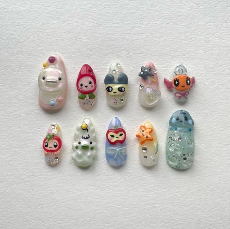 Hand sculpted tamagotchi set 👾 #yegnails #pressonnails #pressonnailsforsale #nails #nailsdesign #nailinspo #nailart #yegbusiness #chromenails #3dnails #3dnailart #tamagotchi #tamagotchinails Tamagotchi Nails, Nailinspo Nailart, Nail Ideas, Nails, Hair