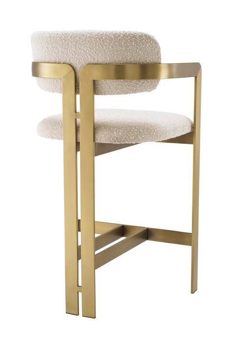 Inviting and refined with a hint of retro design, the Donato Counter Stool will add a touch of vintage style to any space. Featuring a geometric brushed brass frame with a circular seat and curved backrest in a Bouclé cream upholstery, this counter stool pairs comfort with functionality. W21 x D18 x H38 in | Weight 22lbs W53 x D45 x H97 cm | Weight 10kgs Upholstery | 54% polyester | 46% acrylic Legs | Stainless Steel Download Specification Sheet Bar Chairs Design, Gold Bar Stools, Island Stools, Acrylic Legs, Wine Rack Wall, Counter Chairs, Side Table With Storage, European Furniture, Stool Chair