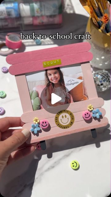 Amanda on Instagram: "Make a back to school craft with me 🍎 

What you’ll need for these diy photo frames:
Thick popsicle sticks (7 per frame)
Thinner popsicle sticks (2 per frame)
Acrylic craft paint 
Glue
Optional stickers, gems, beads etc 

This is a fun afterschool craft if you’ve already started the year or can be used as an activity to get your child excited for the upcoming start of school. 

I attached the “first day” photos using washi tape, so they can easily be replaced if we want to switch the photos out. 

#backtoschool #firstdayofschool #schoolactivities #elementaryart #diycrafts #popsiclesticks #kidsart #kidsactivities #easyart #dollartree #dollartreediy #momhacks #pictureframe #craftwithkids #littleartist" Popsicle Photo Frame, Popsicle Picture Frame, Popsicle Stick Photo Frame, Popsicle Stick Frame, Frames Diy Crafts, Photo Frame Crafts, Start Of School, Foto Frame, Literature Activities