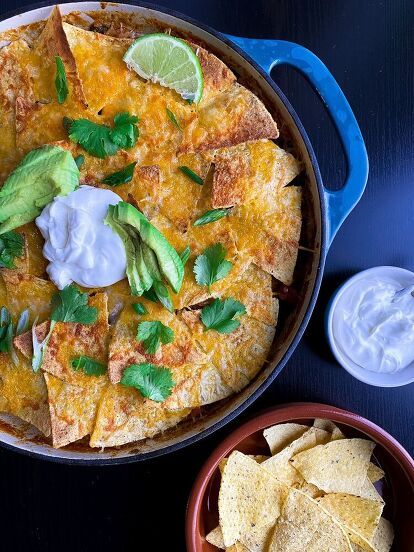 This one-skillet meal is perfect for dinner any night of the week - don't feel obligated to make it for Taco Tuesday! The skillet starts with onions, peppers and garlic sautéed with ground beef (or do turkey!). Then add chipotle peppers and a ton of spices for maximum flavor. Stir in beans, rice and enchilada sauce and let it all simmer down on the stove until the rice is cooked. As is, you have a delicious all-in-one meal that you could scoop into some tortillas. But why stop there???… Cranberry Apple Crumble, Enchilada Rice, Baked Items, Spanish Foods, Chipotle Peppers, Red Enchiladas, One Skillet Meals, Red Enchilada Sauce, Mexican Foods