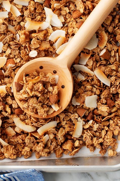 Learn how to make the BEST healthy granola! Made with oats, nuts, coconut, dried fruit, and maple syrup, this homemade granola recipe is easy to make and totally delicious. The perfect breakfast or snack! | Love and Lemons #vegan #granola #breakfast #snacks #healthysnacks