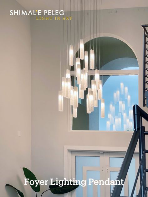 Modern chandelier for high ceiling space such as high ceiling foyer, two-story entryway or stairway. These hanging pendant lighting can be designed to fit even 30ft ceiling and more. The linear glass pendants are made to order to perfectly fit your space and spread glowing warm light in space #foyerlighting #entryway #interiorlighting #chandelierlighting #stainedglass #Artglass #Customlighting Chandelier For High Ceiling, Chandelier For Entryway, High Ceiling Foyer, Foyer Lights, Entry Chandelier, Modern Foyer, Chandelier Lighting Modern, Entryway Chandelier, Modern Farmhouse Lighting