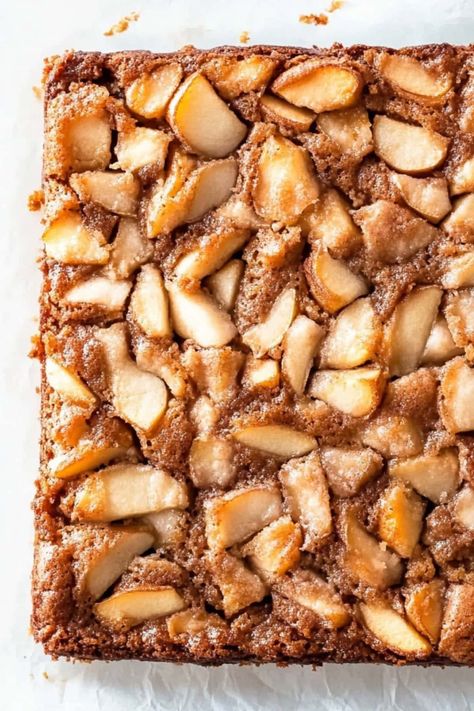 This apple fritter cake features tender cinnamon-spiced apples, fluffy layers of spiced cake, and a luscious glaze that seeps into every bite. Apple Fritters Cake Recipe, Apple Fritter Cake, Baked Apple Fritters, Fluffy Layers, Spiced Cake, Apple Fritter, Apple Varieties, Recipes Fruit, Diced Apples