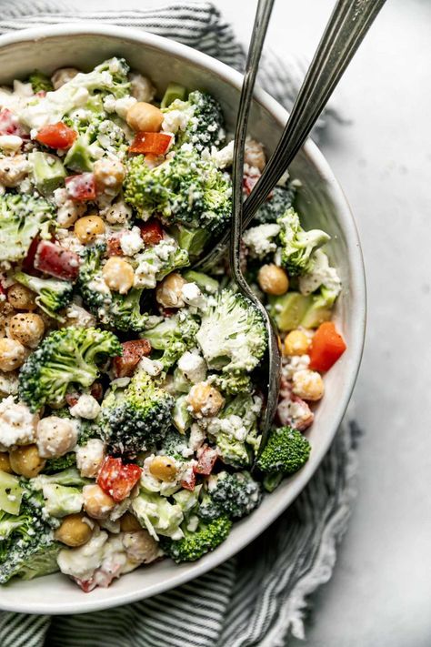 Broccoli tossed with bell pepper, chickpeas, & crumbled feta in a tangy lemon Greek yogurt dressing, this healthy broccoli salad is a family favorite & it's an absolute go-to during the summer months! Made with 7 simple ingredients & prepped in 15 minutes or less (no-cook!), this broccoli salad recipe is a quick & easy side dish for any weeknight dinner, backyard BBQ, potluck, or picnic this summer! #broccolisalad #broccolisaladhealthy #broccolirecipes #sidedishes #sidedishesforbbq #picnicfoods Broccoli Salad With Greek Yogurt, Light Broccoli Salad, Dinner Backyard, Recipe With Greek Yogurt, Quick Easy Side Dishes, Bbq Potluck, Lemon Greek Yogurt, Creamy Broccoli Salad, Healthy Broccoli Salad