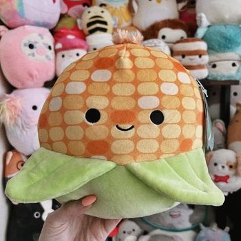 Cobie | Squishmallows Wiki | Fandom Green Squishmallow, Corn On Cob, Yellow And Green, Shades Of Orange, Family Farm, Yellow And Brown, Say Hi, Travel Pillow, The Sky