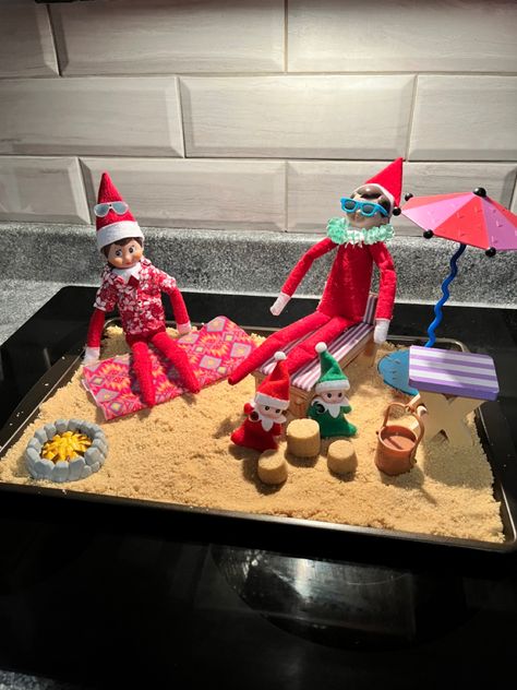 Elves hit up the beach ! Elf On The Shelf Moana, Tropical Elf On The Shelf, Elf On The Shelf Hawaii, Beach Elf On The Shelf, Elf On The Shelf Pool Party, Elf On The Shelf Beach Ideas, Elf Swimming, Elf On The Shelf Beach, Elf Ideas Easy