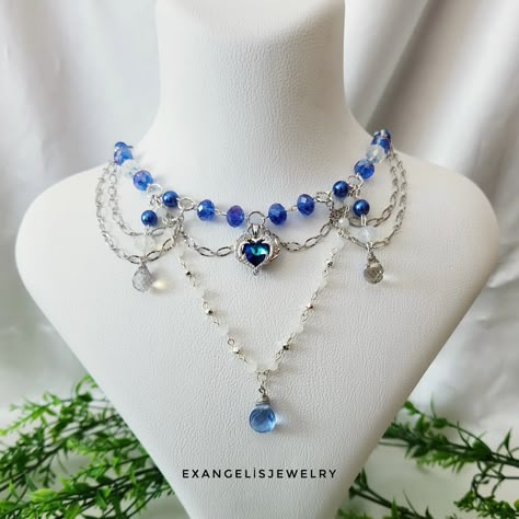 Blue Beaded Fairycore Necklace with Stainless Steel Zircon Heart Pandent Available in my Etsy shop ExangelsJewelry.etsy.com . . #fairycore #fairycoregrunge #fairycorenecklace #grungestyle #grungejewelry #grungenecklace #celestial #etherealaesthetic #encharting #cottagecore #cottagecoreaesthetic #cottagecorenecklace #y2kaesthetic #y2knecklace #celestialcore #princesscoreaesthetic #necklaceforgift #blueaesthetic #bluefairy #bohamianstyle #bluebeadednecklace #stainlesssteelpendant Kawaii Business, Fairycore Necklace, Gothic Jewelry Diy, Grunge Necklace, Grunge Jewelry, Y2k Necklace, Blue Beaded Necklace, Handmade Jewelry Tutorials, Jewelry Accessories Ideas