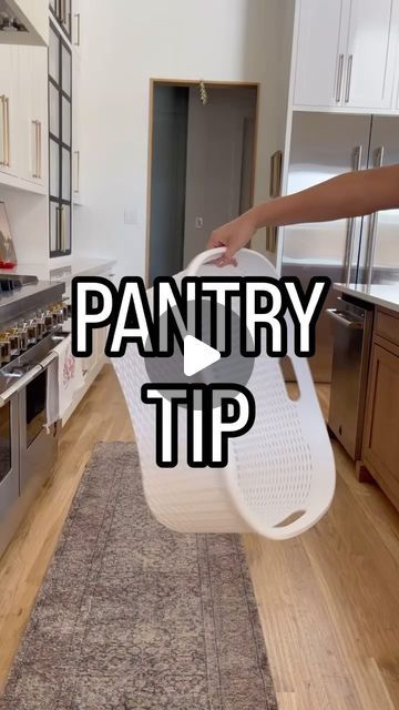 Kim | Organizing Expert on Instagram: "Comment PANTRY & if you follow me you’ll automatically get a DM with the link. 🔗

✨ PANTRY TIP ✨ If you have deep shelves in your pantry then you need these cute woven (plastic) laundry baskets! You can’t even tell they are laundry baskets from the way they are positioned here. Just because they are normally used for clothes doesn’t mean you can use them for something else. 😉

What to store in large bins? 
▪️small appliances 
▪️water bottles
▪️sodas
▪️lunch boxes
▪️reusable shopping bags 
or anything big, bulky & ugly that you want to hide." Cabin Pantry, Pantry Plans, Organizing Storage, Deep Shelves, Laundry Baskets, Pantry Design, Reusable Shopping Bags, Plastic Laundry Basket, Lunch Boxes