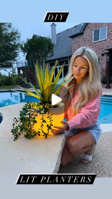 Macy Blackwell on Instagram: "DIY Lit Planters!🌿✨ So easy and beautiful for your outdoor spaces this summer! Remote controlled!   - 2 plastic planters: one slightly larger  - Strand of fairy lights (& tape) - Faux or real plant  - decorative rocks   1. Start by wrapping the fairy lights around the inside of the larger planter. Secure with clear tape.  2. Add the second planter, fill with favorite plants and decorative rocks or moss to fill up any empty space.  My exact supplies linked in my LTK and Amazon storefront!  #summerdiy #litplanters #summerhome #summerparty #summerideas #diy" Macy Blackwell, Decorative Rocks, Summer Planter, Potted Plants Outdoor, Fire Places, Clear Tape, Diy Outdoor Decor, Plastic Planters, Backyard Lighting