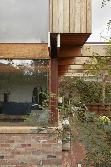 From the Architect: Footscray I explores craft and economy in a two storey rear addition to an existing double fronted Edwardian dwelling. The existing dwelling was defined as the sleeping/quiet living wing and the new extension as an active and robust space that engages directly with the backyard. The living space centres around a combined dining table/kitchen bench characterised by a herringbone timber benchtop. Timber Benchtop, Quiet Living, Dining Table Kitchen, Kitchen Bench, Australian Architecture, The Local Project, Timber Cladding, Timber House, The Architect